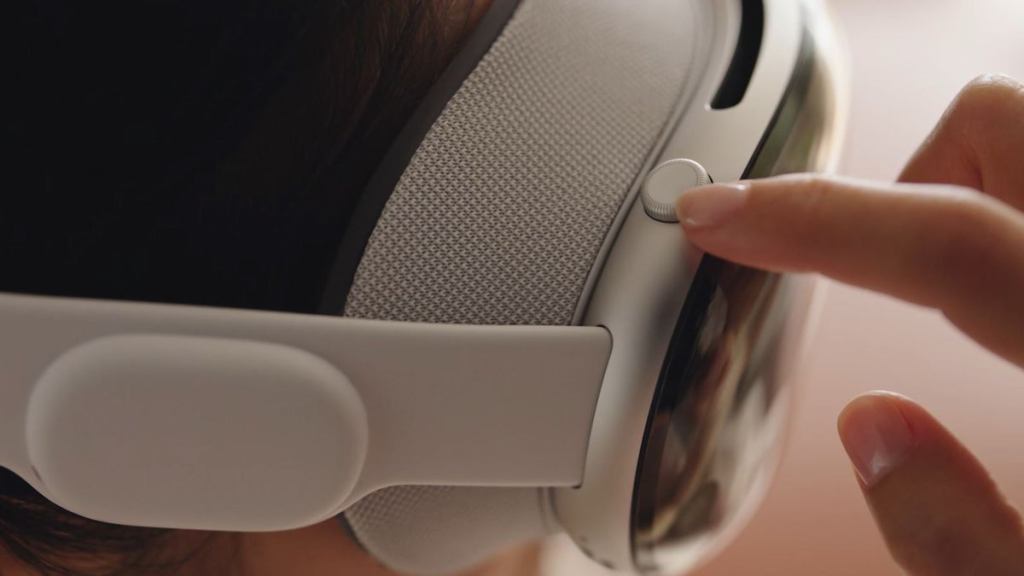 A photo of a person using the Digital Crown on Vision Pro